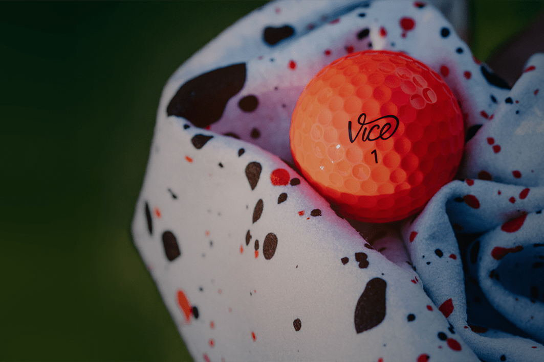 Golf ball in cloth, ready to be cleaned