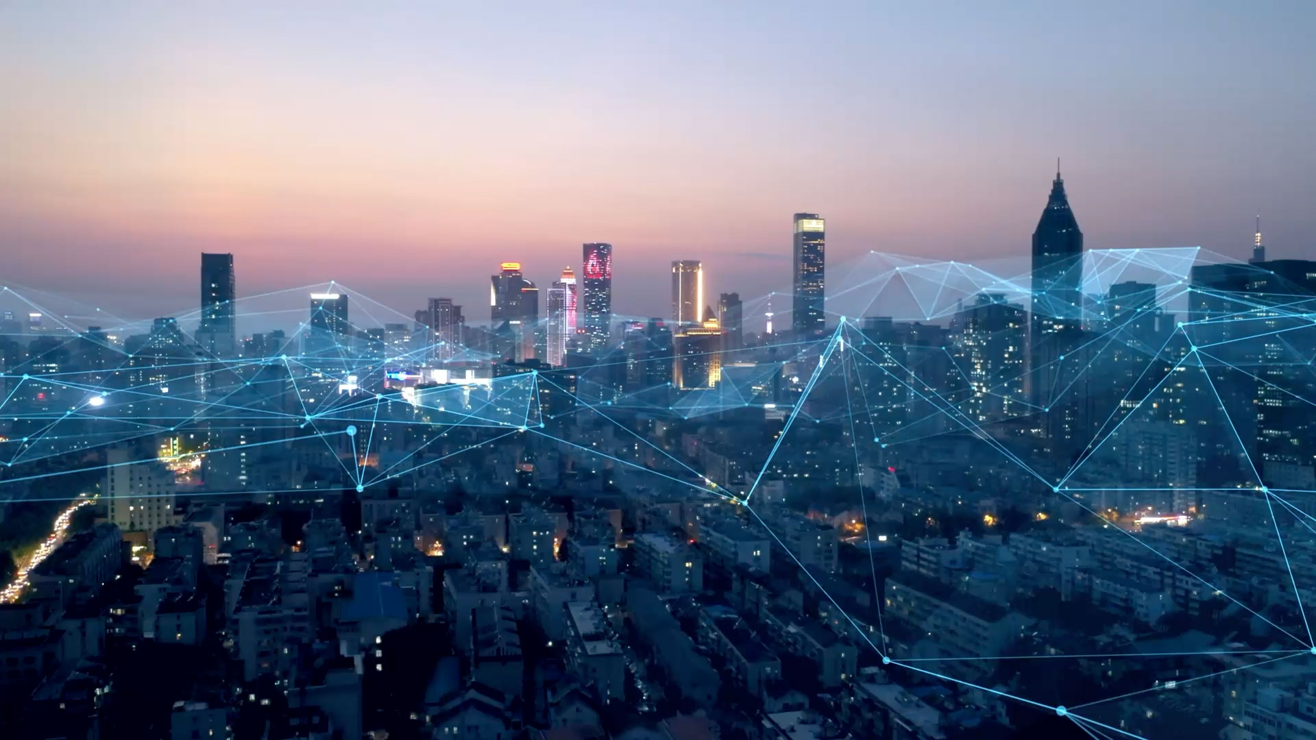 Cityscape at night with cgi network overlaid