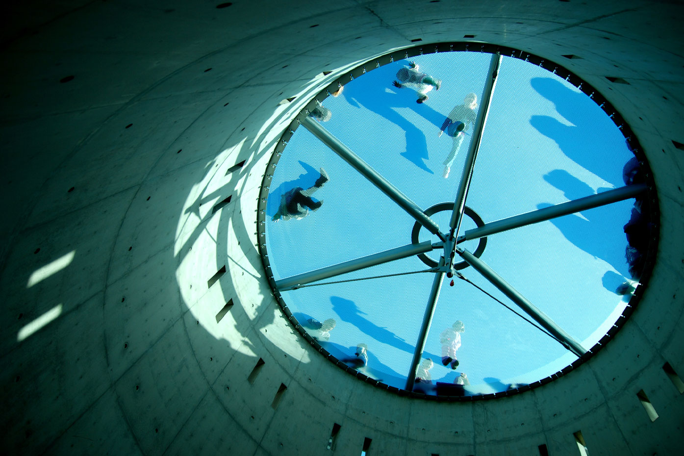 Below a round transparent blue walkway